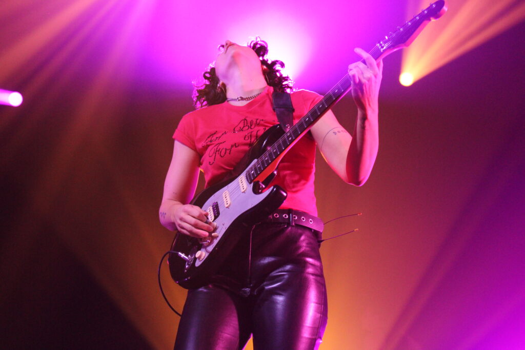 Guitarist Josette Maskin's lively energy never wavered, maintaining upbeat dancing throughout the show.