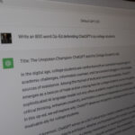 A photo showing ChatGPT being asked to write an 800 word article defending itself.