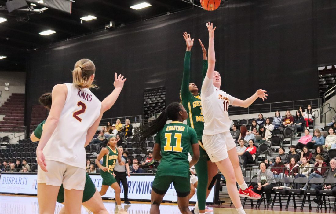 Bessette sends the ball up towards the net. (Andi Revesz | The Phoenix)