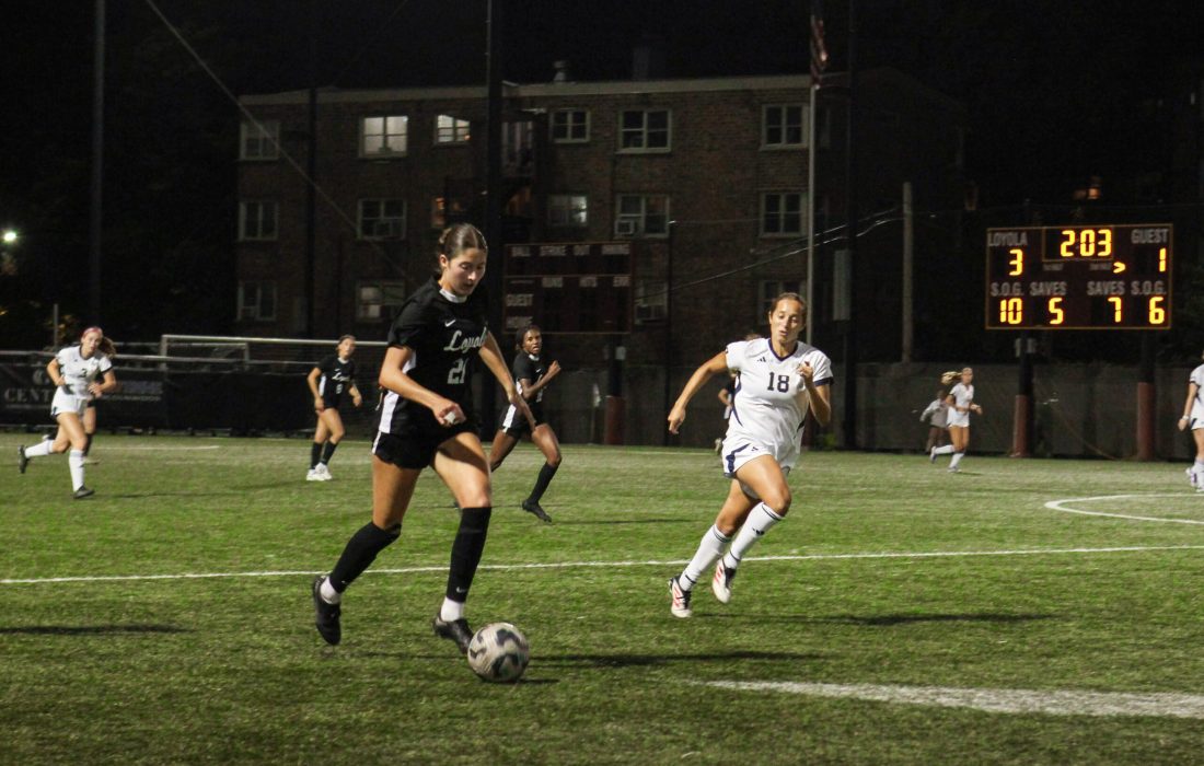 Schmidt dribbles down the pitch during the 3-1 win for the Ramblers. (Bella Adams | The Phoenix)