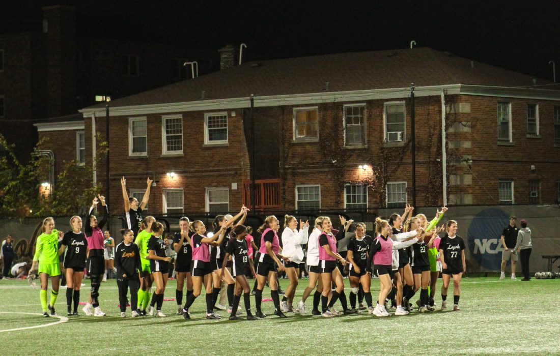 The Ramblers celebrate post game. (Bella Adams | The Phoenix)