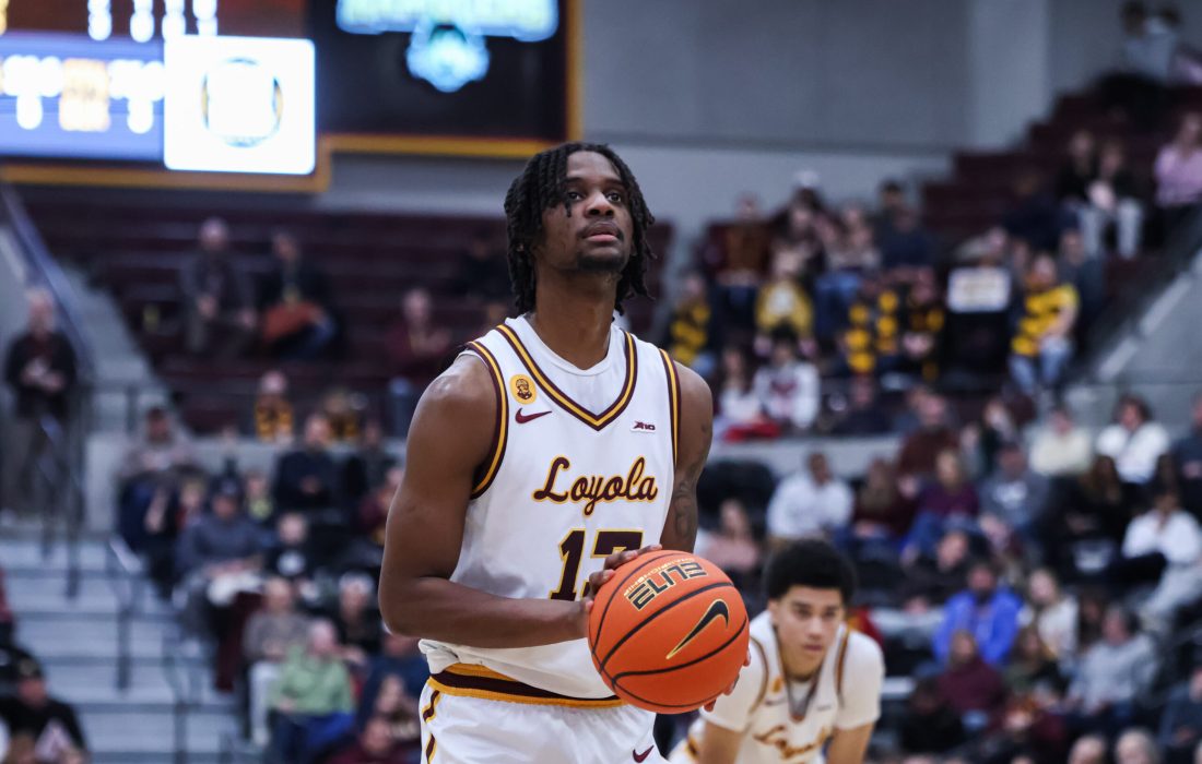 Amos prepares to take a shot at the line. (Kayla Tanada | The Phoenix)