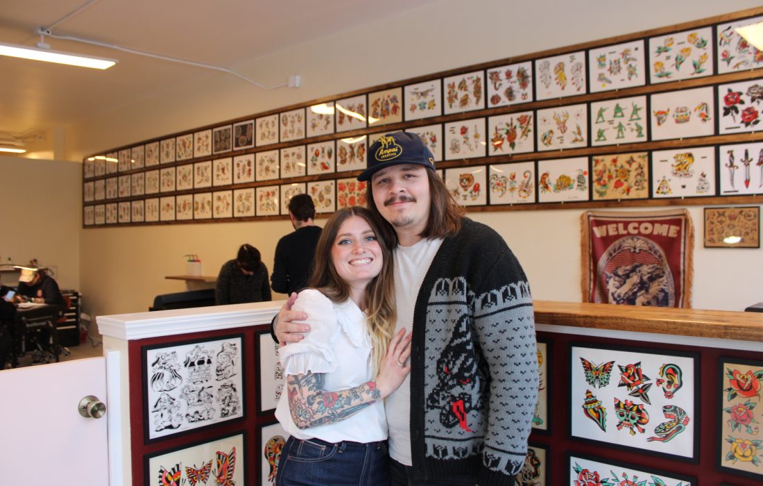 Married couple Jonny and Carly Watson run the tattoo club. (Julia Pentasuglio | The Phoenix)