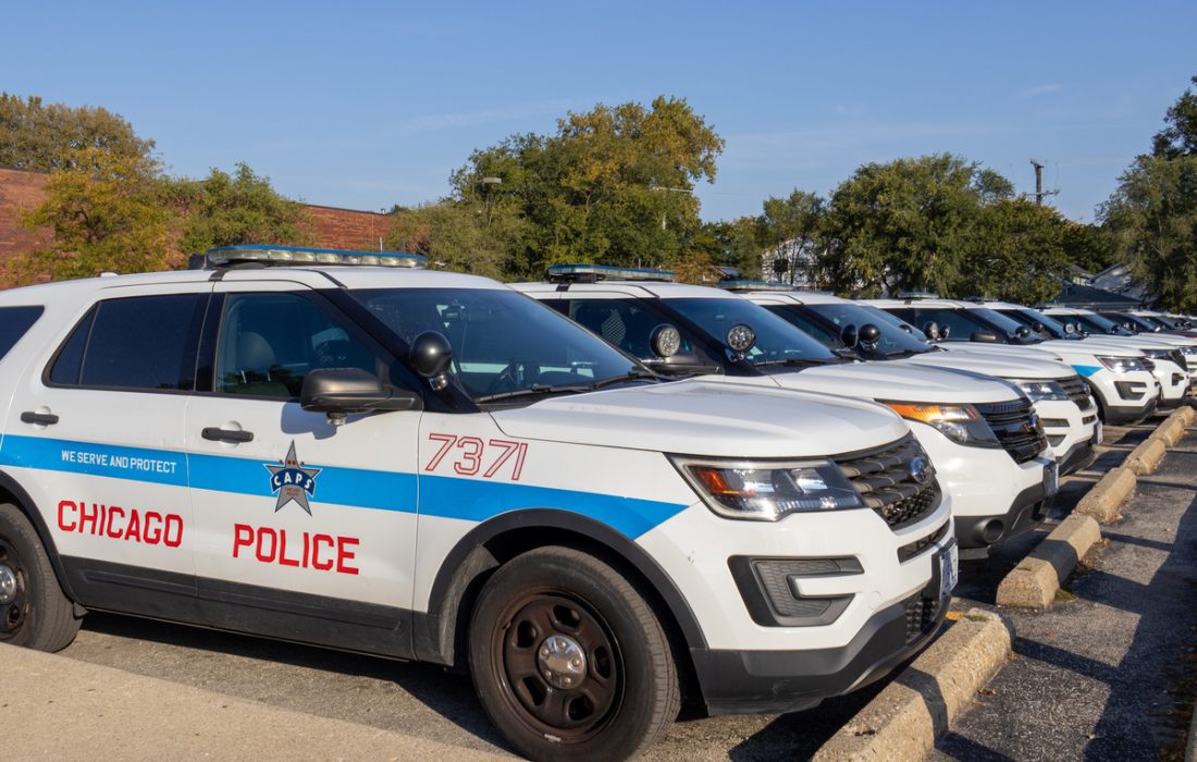 Chicago Police Cars sit parked outside of the Chicago Police Department building. (Katrina De Guzman/The Phoenix)