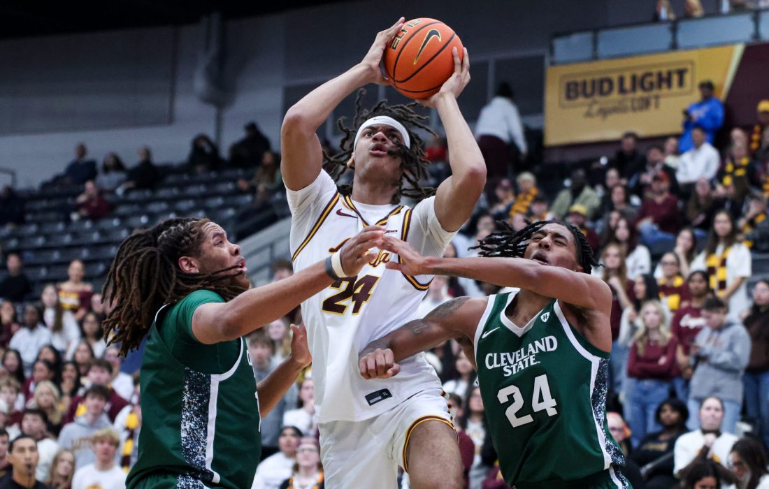 Rubin goes in for a layup through Cleveland State's defense. (Kayla Tanada | The Phoenix)