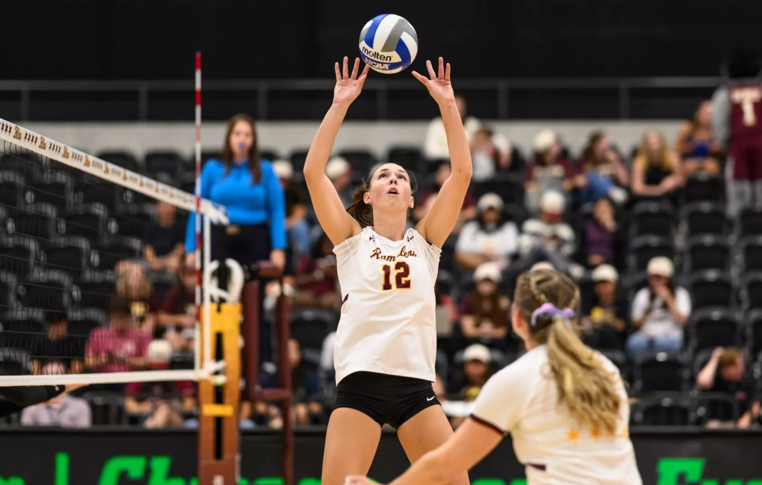 Josie Halbleib sets up a kill in Loyola's 3-1 win. (Courtesy of Loyola Athletics)
