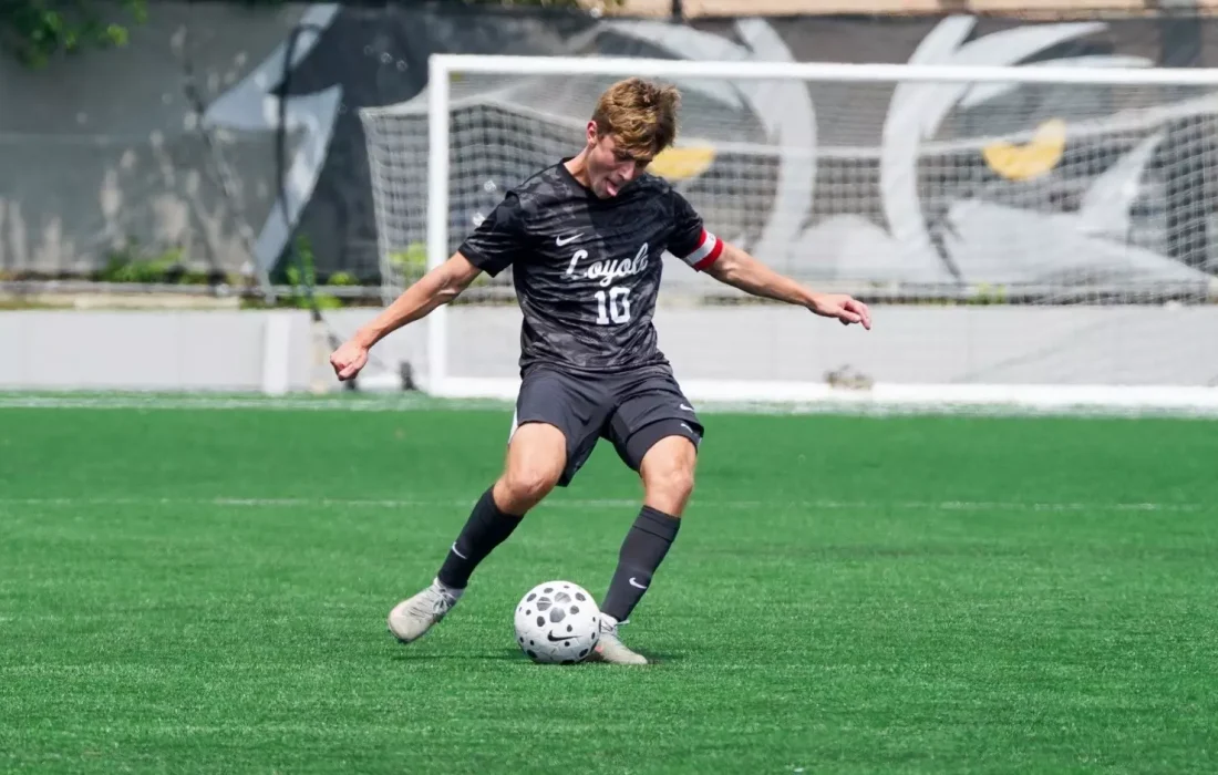 Third-year midfielder Luka Ivancic in the middle of a play (Courtesy of Loyola Athletics)