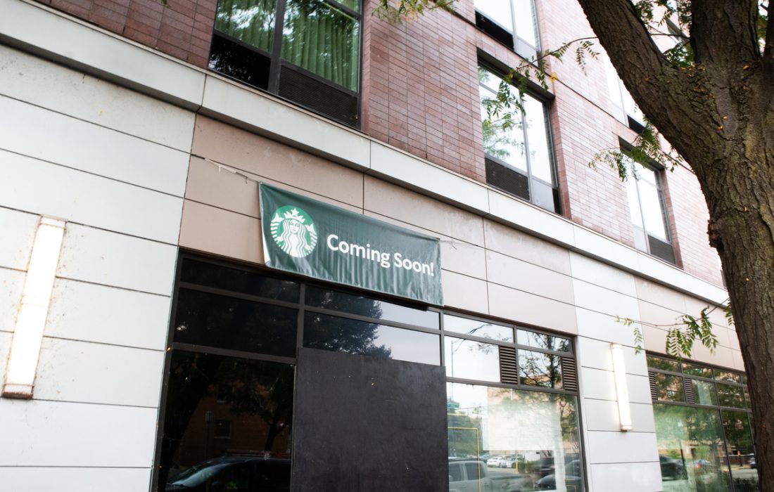 Since its debut at Pike’s Place Market in 1971, coffee’s infamous forest-green, two-tailed siren has cropped up so pervasively across the country it has fostered its own cliché — there’s a Starbucks on every corner. (Malika Chailertborisuth | The Phoenix)