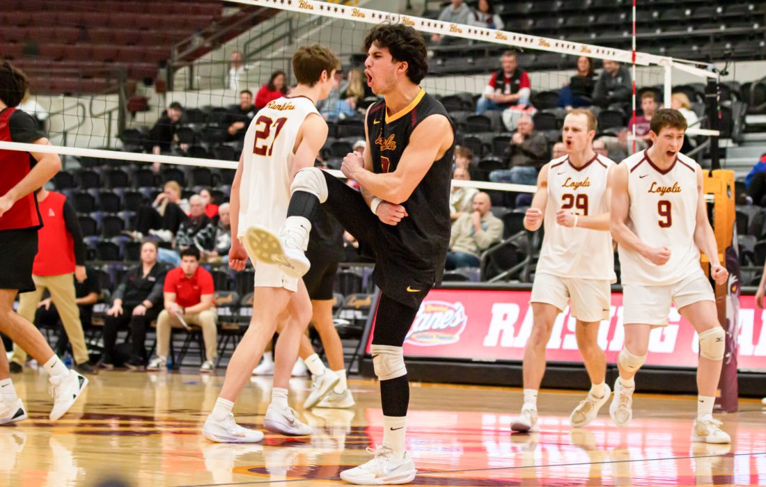 Libero JJ Sowa celebrates after the Ramblers get a point. (Megan Dunn | The Phoenix)