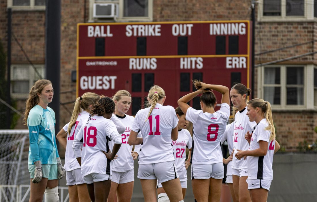 The Ramblers huddle together before a home match. (Niko Zvodinsky | The Phoenix)