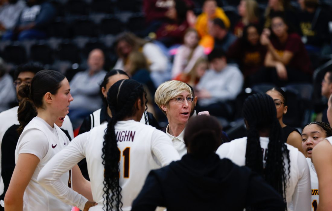 Allison Guth coaches the Ramblers during a timeout. (Norman Tiedemann | The Phoenix)
