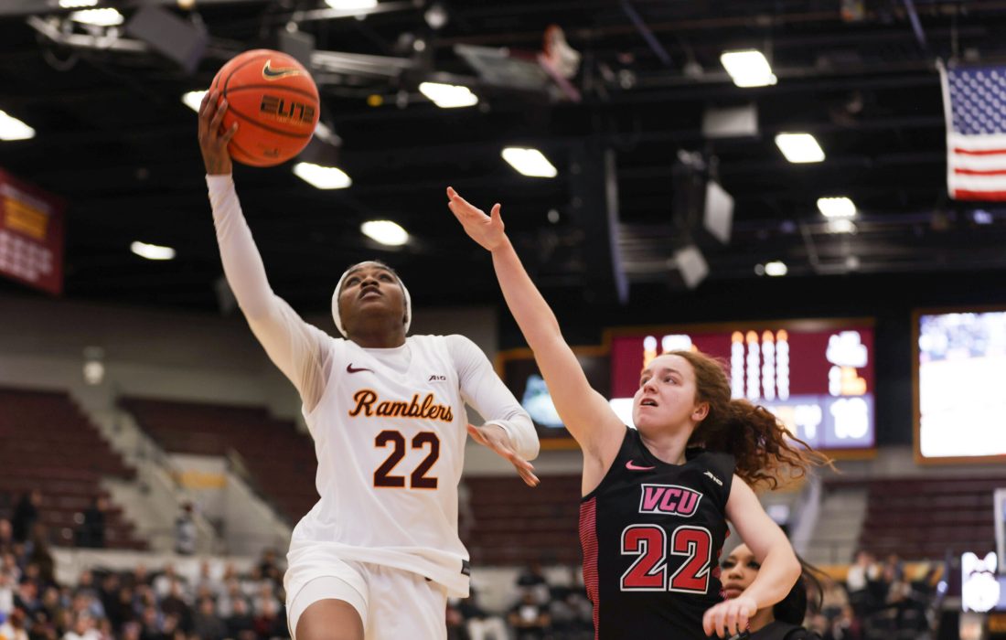 Graduate guard Alexus Mobley drives to the basket for a layup en route to her season high 23 points. (Norman Tiedemann | The Phoenix)