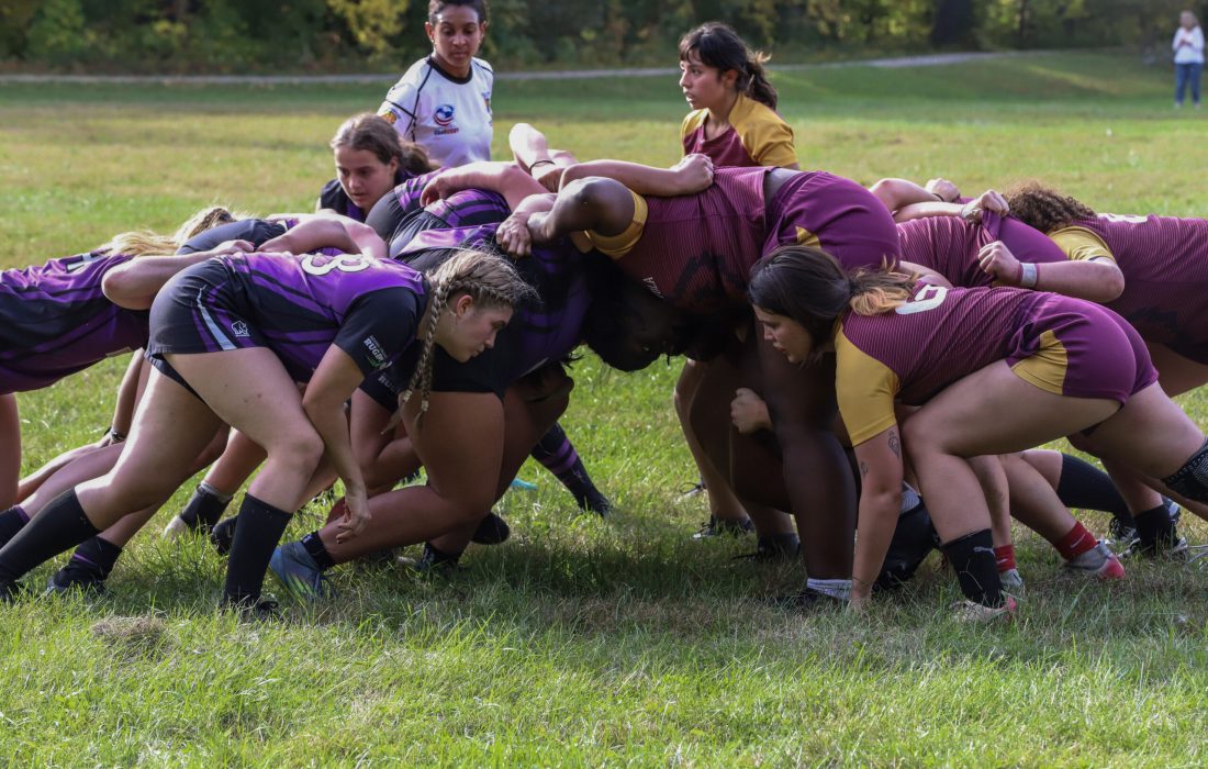 Both teams scrum after a penalty. (Sadie Harlan | Loyola Phoenix)