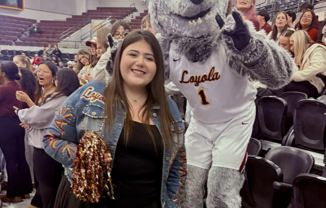 Sheridan Gorman, 18, is pictured with Lu Wolf at a Loyola basketball game. (Sheridan Gorman's Instagram)