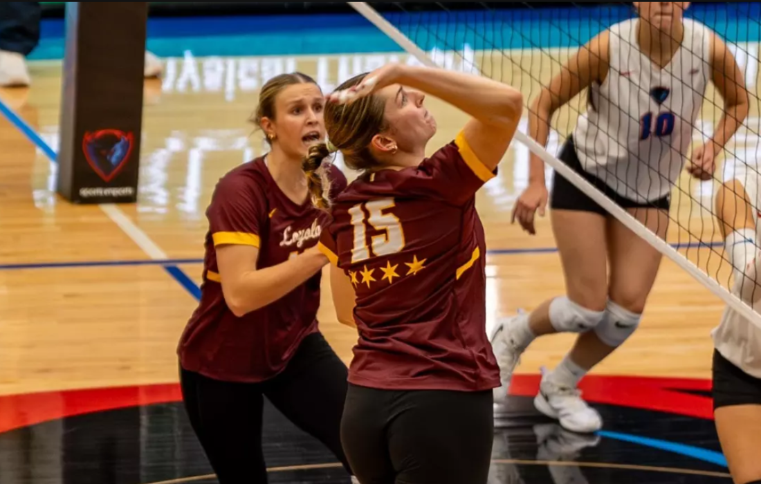 Fourth-year middle blocker Avary DeBlieck in the middle of action. (Courtesy of Loyola Athletics)