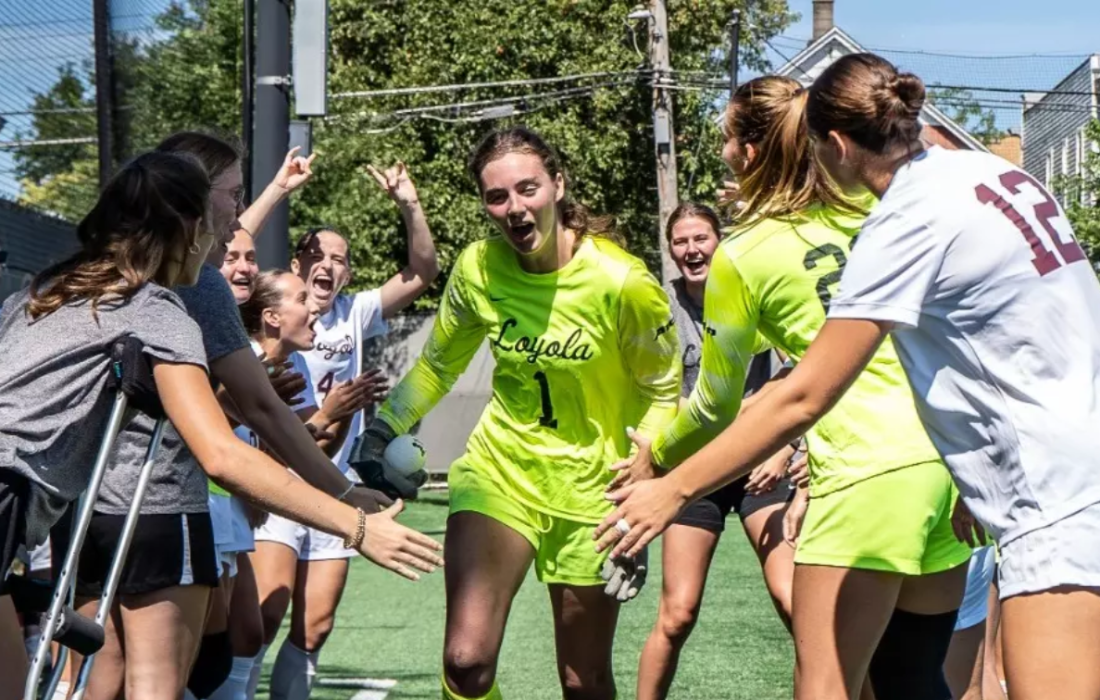Women's soccer celebrates the successful match. (Courtesy of Loyola Athletics)
