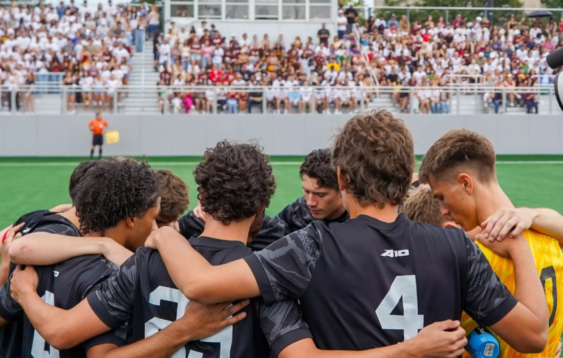 Men's soccer preparing for their next play. (Courtesy of Loyola Athletics)