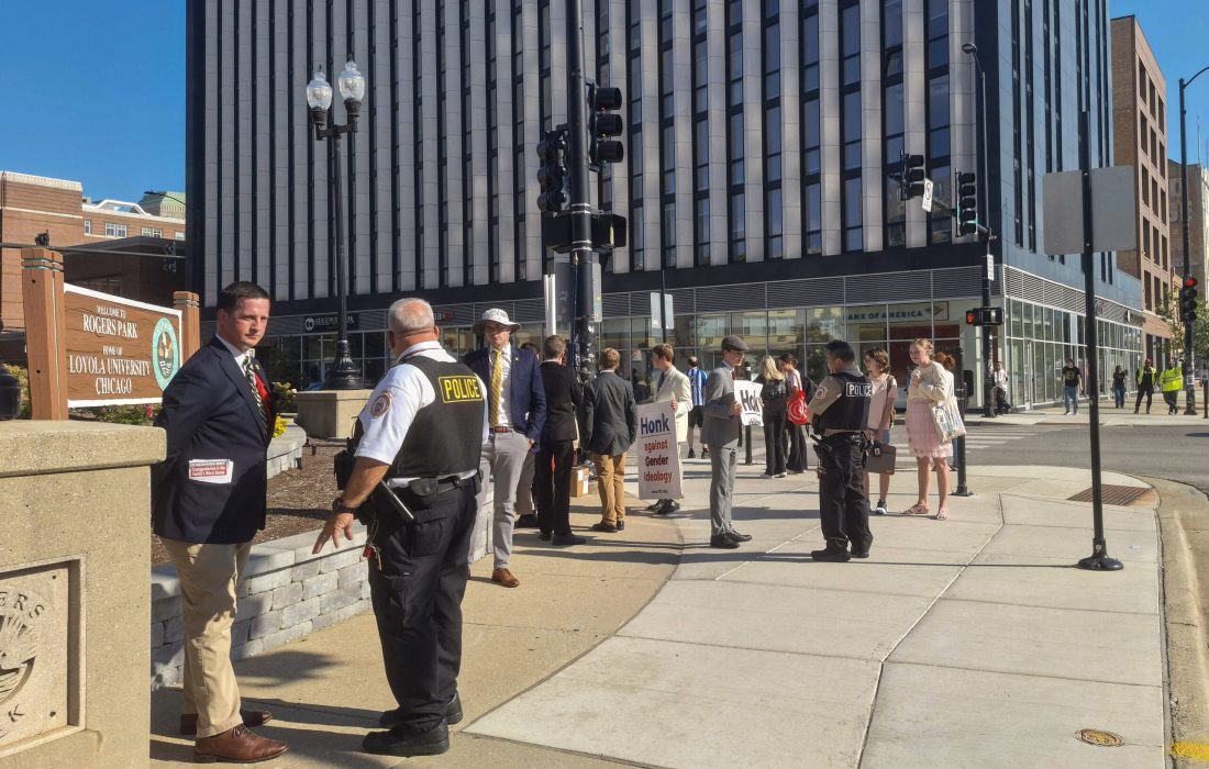 The conservative group gathered on the traffic triangle. (Skye Weaver | The Phoenix)