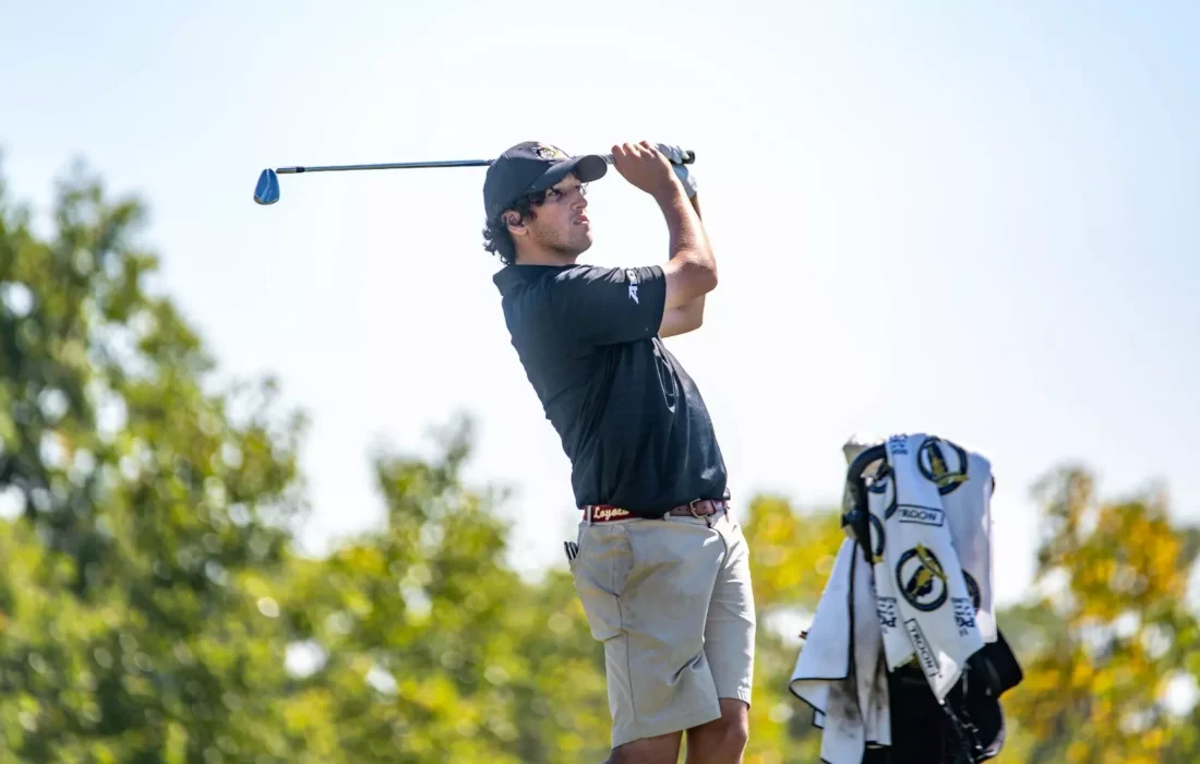 Charlie Kulwin watches a drive at the Virtues Intercollegiate tournament (Courtesy of Loyola Athletics)