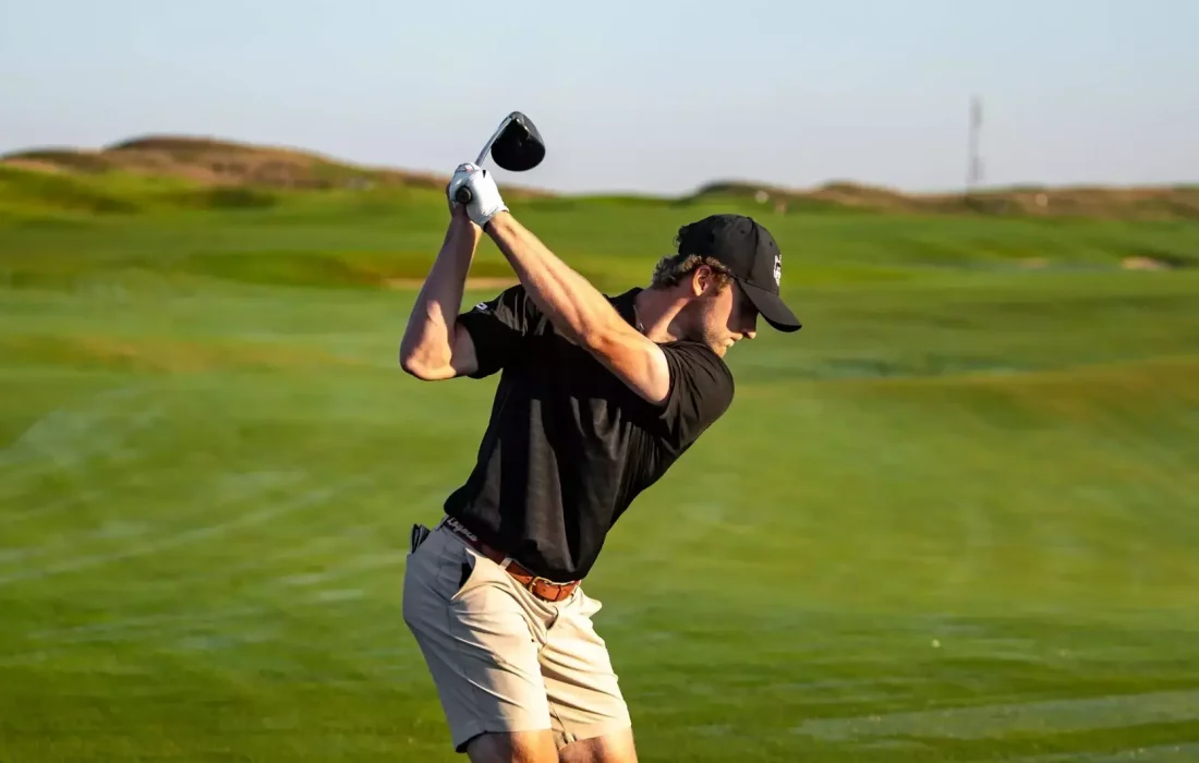 Fourth-year Sebastian Kasun tees off at the Mobile Bay Intercollegiate. (Courtesy of Loyola Athletics)