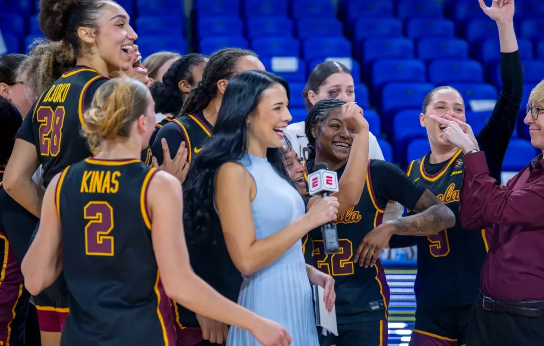 The team celebrated with head coach Alison Guth post-win. (Photo Courtesy of Loyola Athletics)