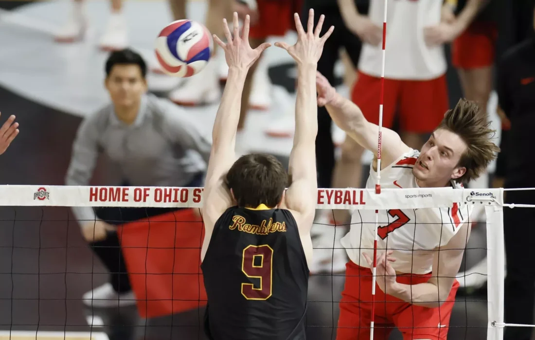 McElligott goes up for a block against Ohio State. (Courtesy of Loyola Athletics)