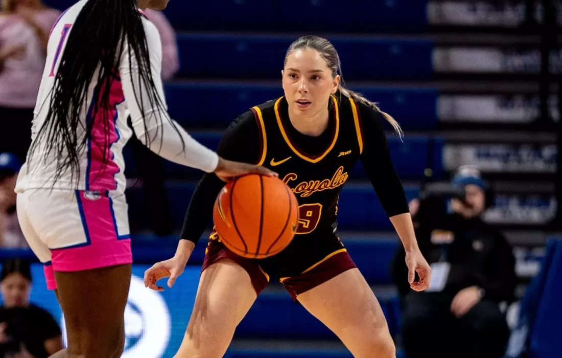 Mercille guards a Billiken. (Courtesy of Loyola Athletics)