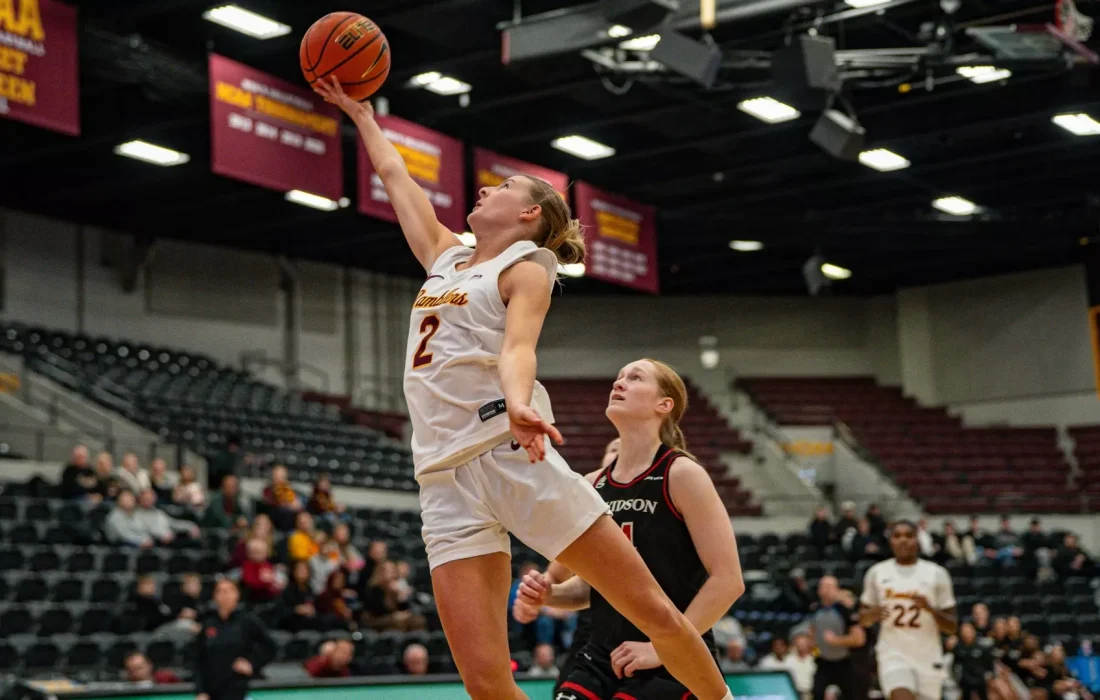 Kinas sends in a layup against the Wildcats. (Courtesy of Loyola Athletics)