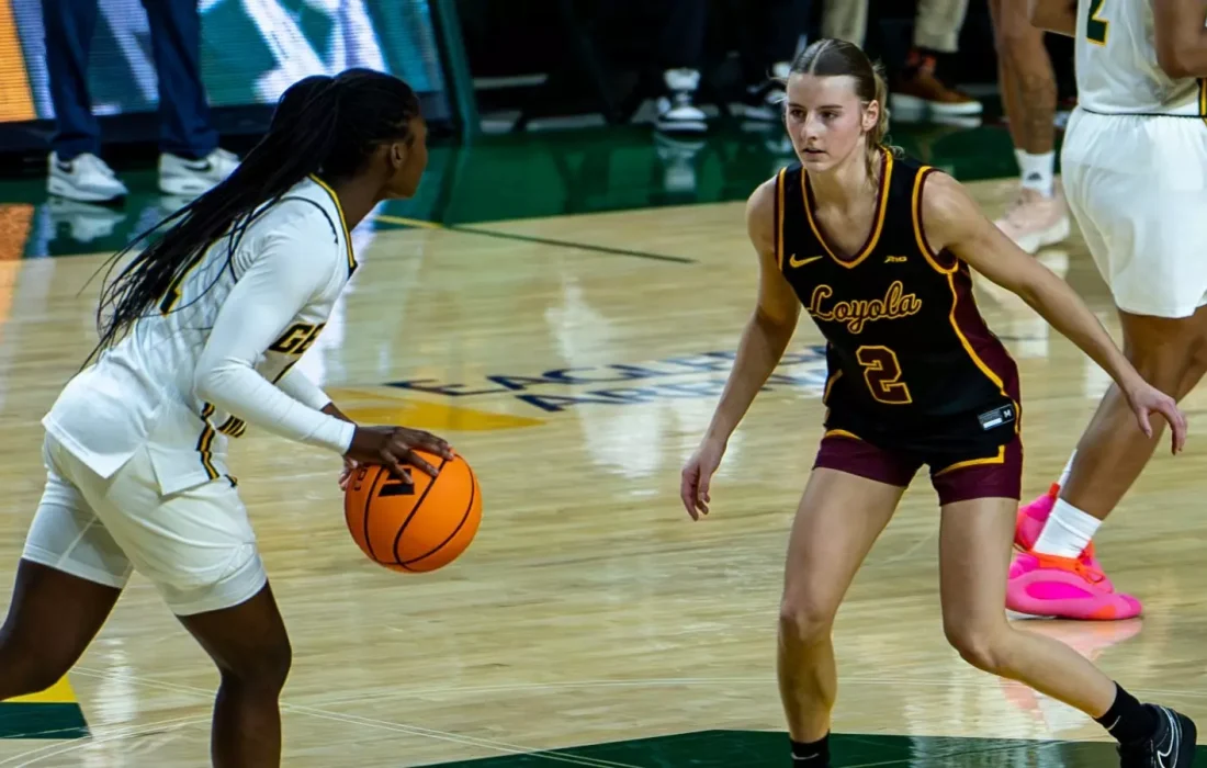 Kinas guards George Mason's offense. (Courtesy of Loyola Athletics)