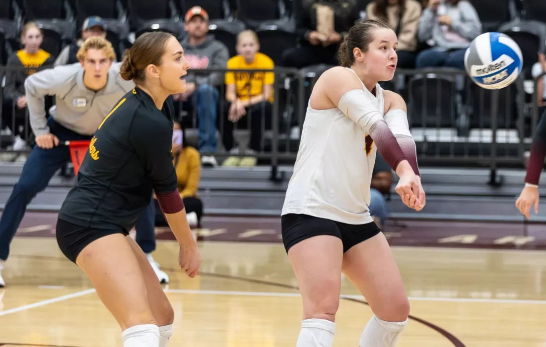 Second-years Jae Fitting and Sam Falk fight for the return. (Courtesy of Loyola Athletics)