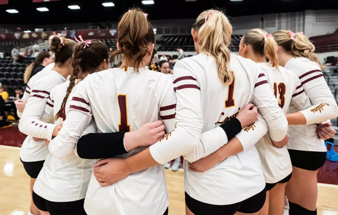 The Ramblers huddle during their loss against Iowa. (Courtesy of Loyola Athletics)