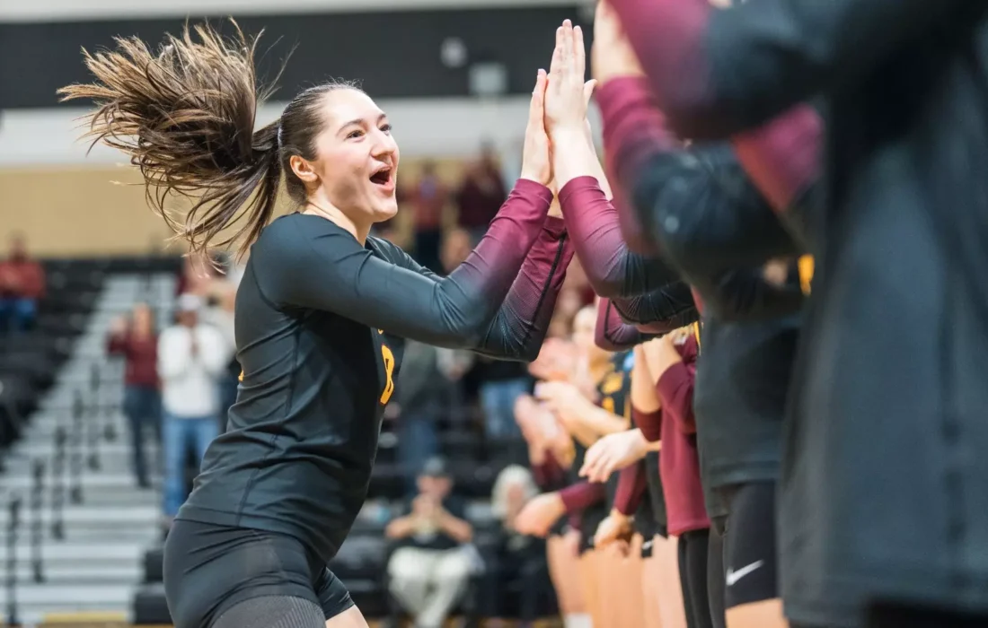 Fourth-year Ann Marie Remmes with her teammates before the match. (Courtesy of Loyola Athletics)