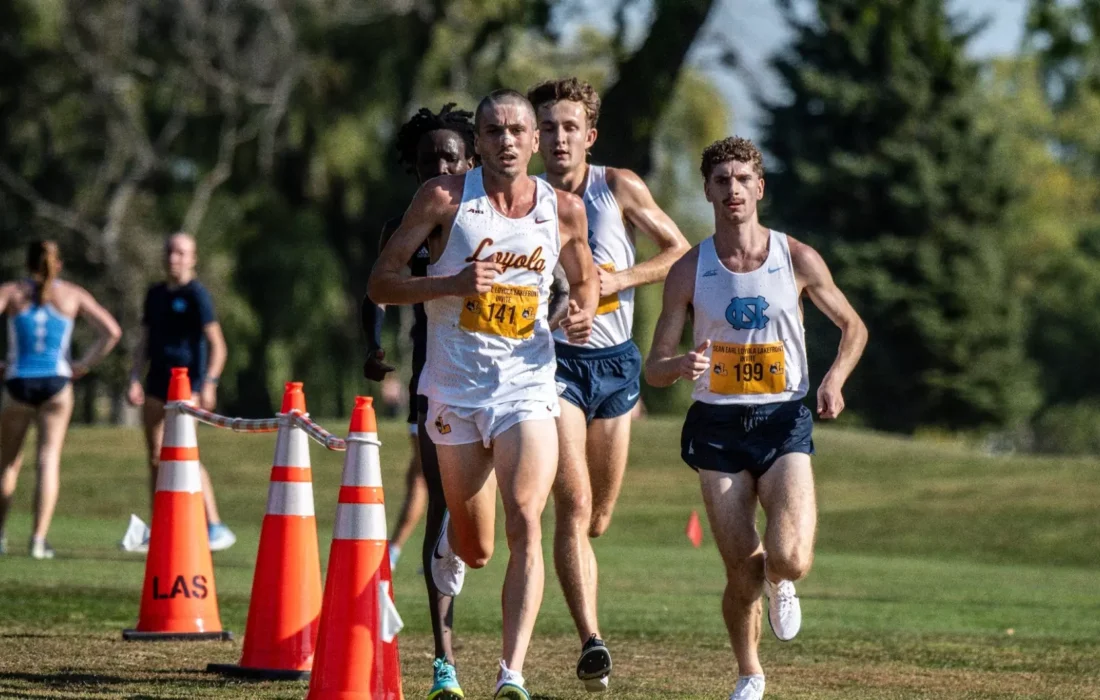 Graduate William Sinclair leads the pack en route to his fourt place finish. (Courtesy of Loyola Athletics)